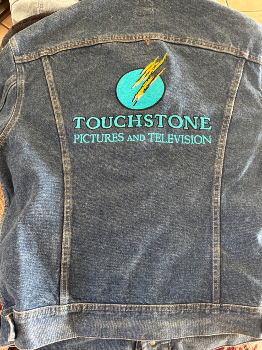 Disney Touchstone Denim Jacket in Blue with Teal and Yellow Logo